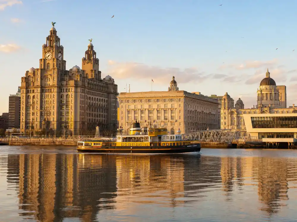 Liverpool Royal Liver Building and Mersey ferry representing Bonnie-Chance Roberts wife of Beanie Feldstein pregnant star