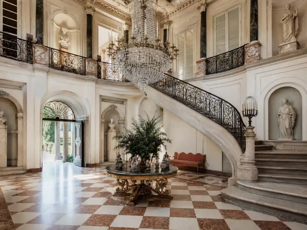 Marble foyer and double staircase typical of the Bruce Willis Beverly Hills home sold interior