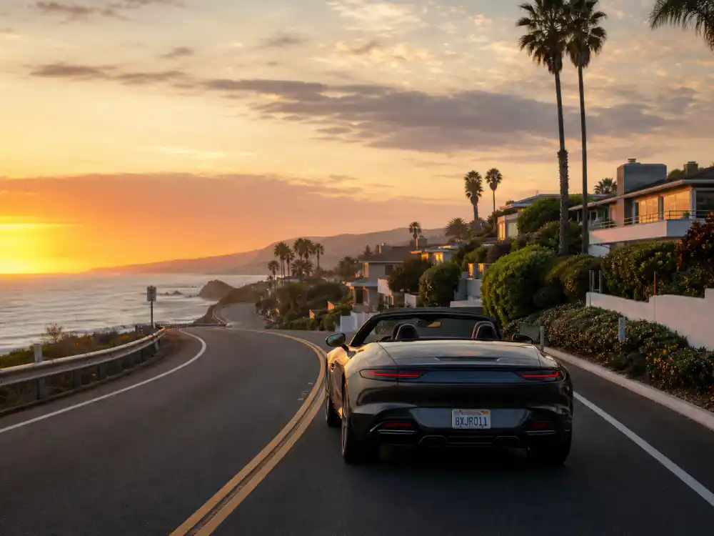 Pacific Coast Highway winding through Malibu at sunset where celebrities who live in Malibu drive home along the ocean