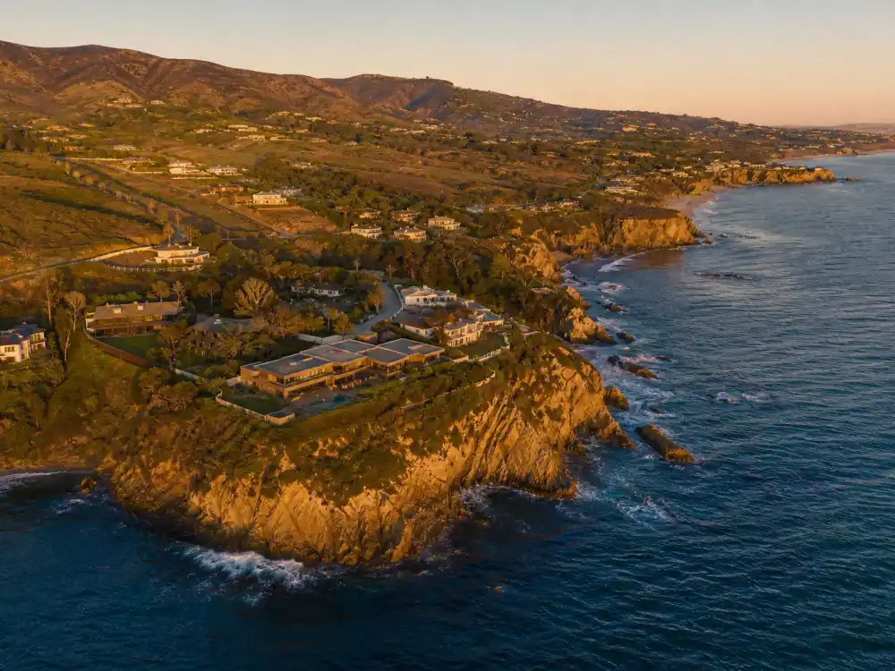 Aerial view of Point Dume Malibu coastline with bluffside estates where many celebrities who live in Malibu have settled