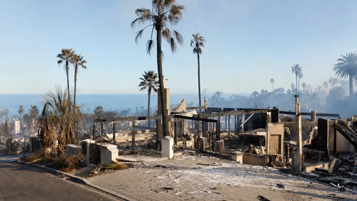 Aerial of fire-damaged hillside neighborhood representing the celebrities who lost homes LA fires aftermath
