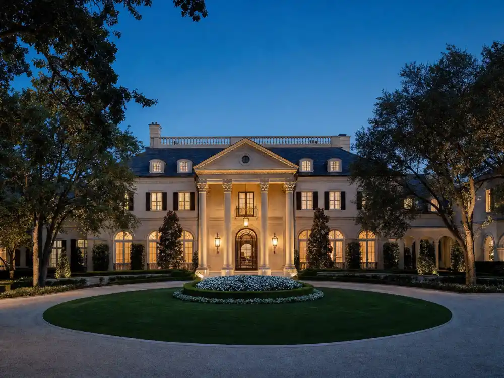 Grand Dallas mansion with iron gates and circular driveway among the new homes of the celebrities who moved to Texas