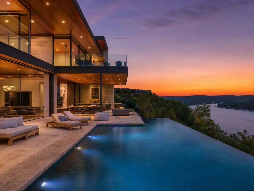 Westlake Austin contemporary luxury home with pool overlooking the lake representing the celebrities who moved to Texas