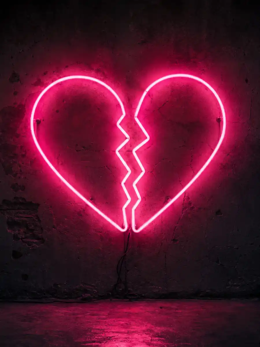 Broken heart neon sign representing celebrity breakups 2026 complete list