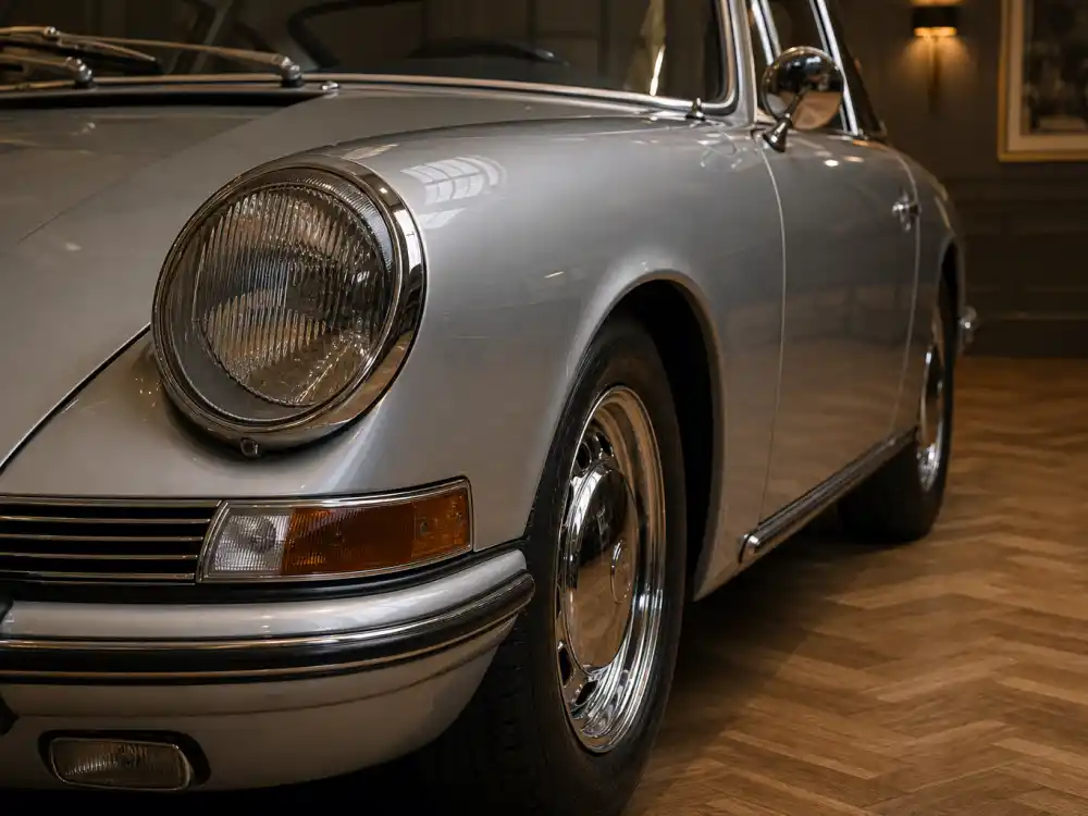 Vintage silver Porsche detail shot from celebrity car collections worth most