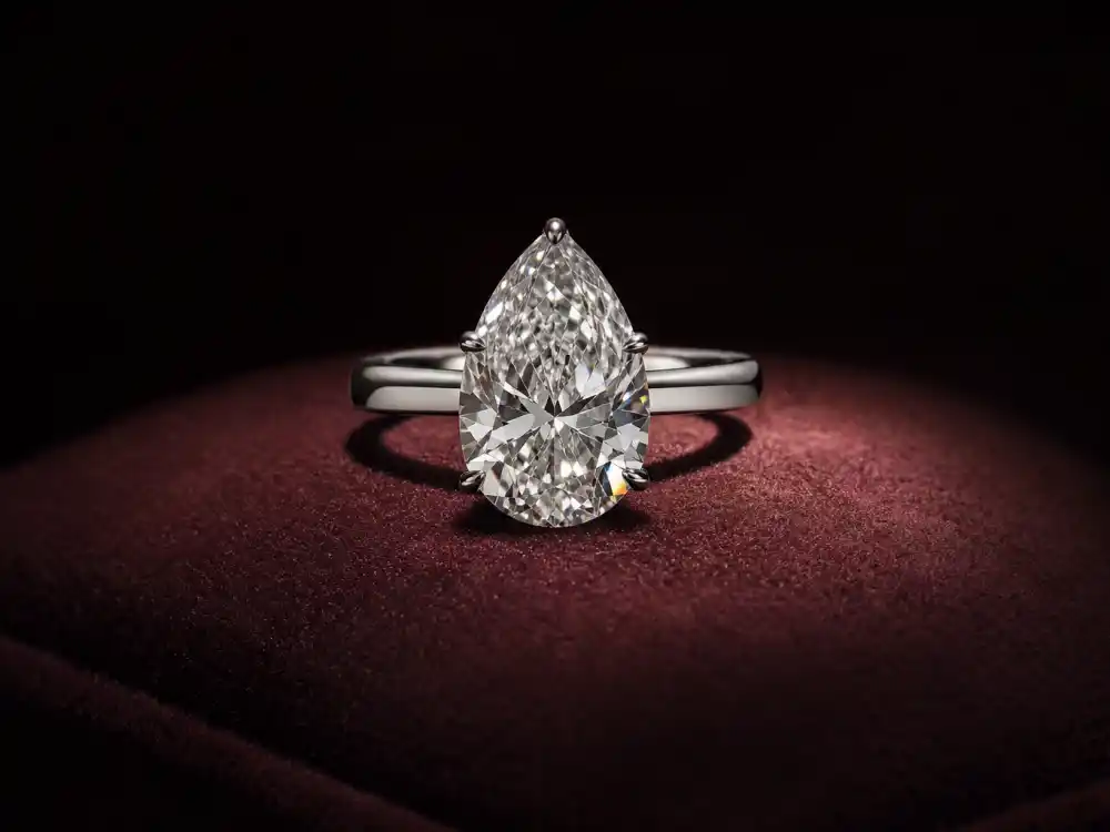 Luxury pear-cut diamond engagement ring similar to the Zoë Kravitz Harry Styles engagement ring