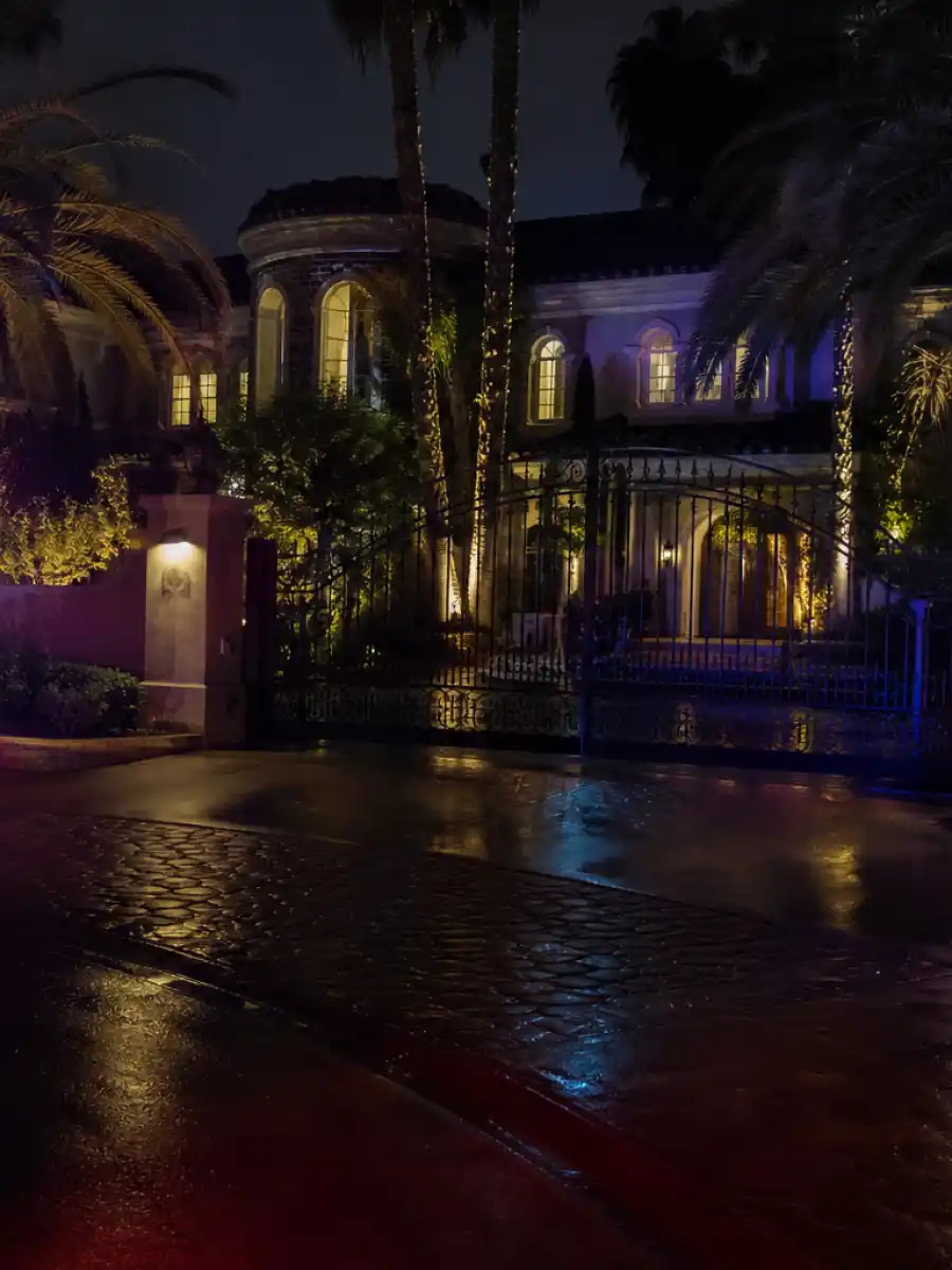 Chris Brown shooting Tarzana home exterior at night with police lights