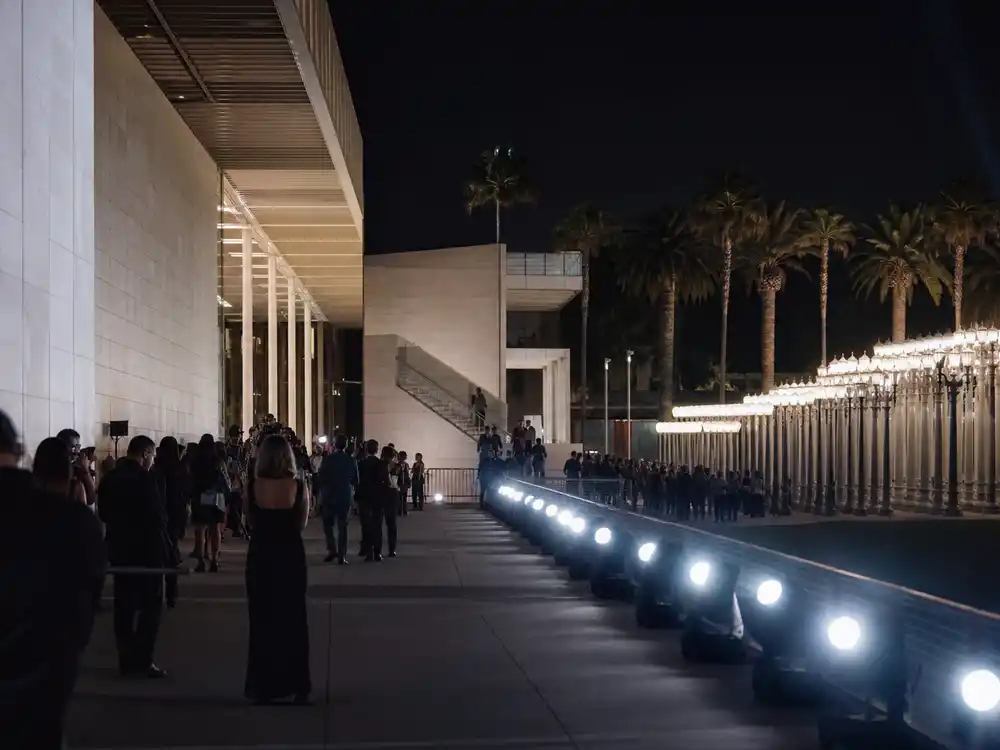 Runway lights near a Los Angeles museum setting illustrate the Dior Cruise 2027 LACMA appearance.