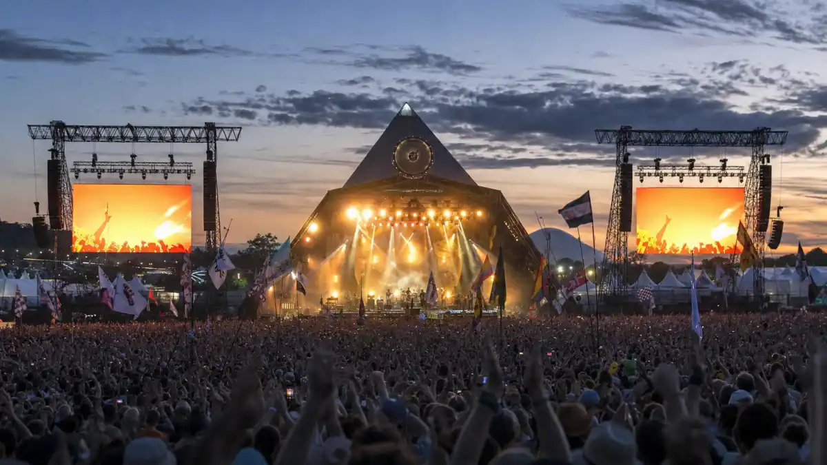 Glastonbury music festival main stage where Dua Lipa Callum Turner were spotted together in the crowd