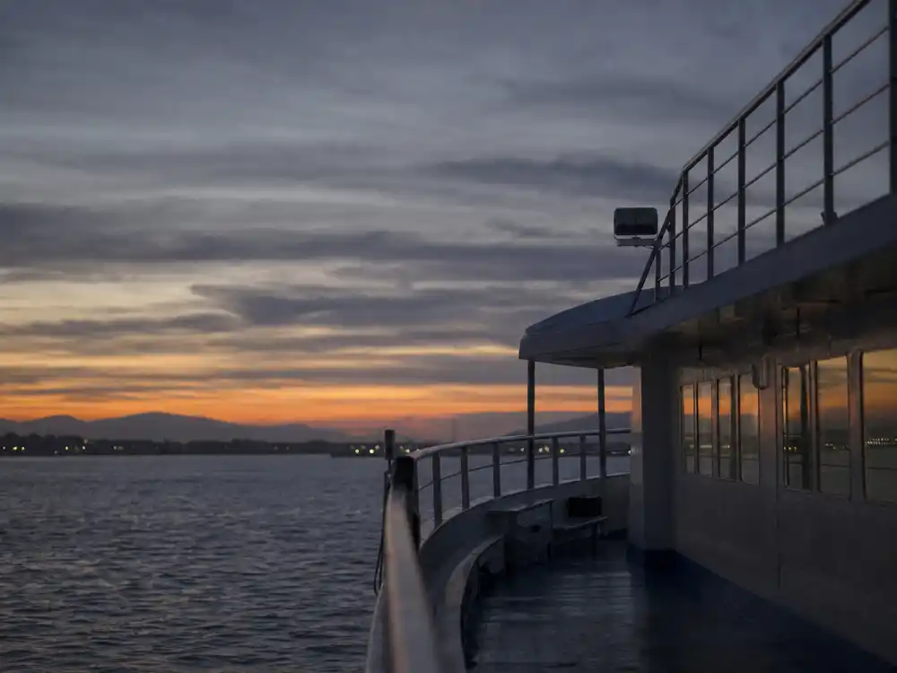 An empty boat deck at dusk represents the Hayden Panettiere memoir account without showing people.