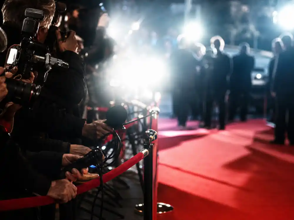 Red carpet cameras capture celebrity reaction around the Jamie Foxx baby report.