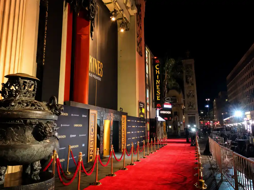 Movie premiere theater exterior at night typical of events where Jenna Ortega boyfriend rumors often surface