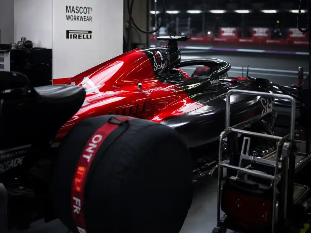 Formula 1 race car in pit lane representing Kim Kardashian boyfriends list and Lewis Hamilton relationship