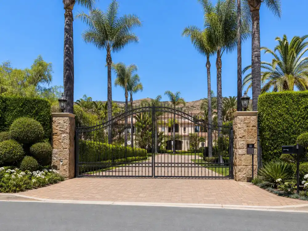 Luxury gated mansion entrance in Calabasas where Kim Kardashian Kanye West kids reside