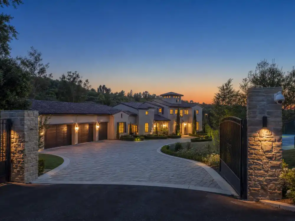 Front gates and motor court of the kind featured in the Kylie Jenner Hidden Hills sale listing