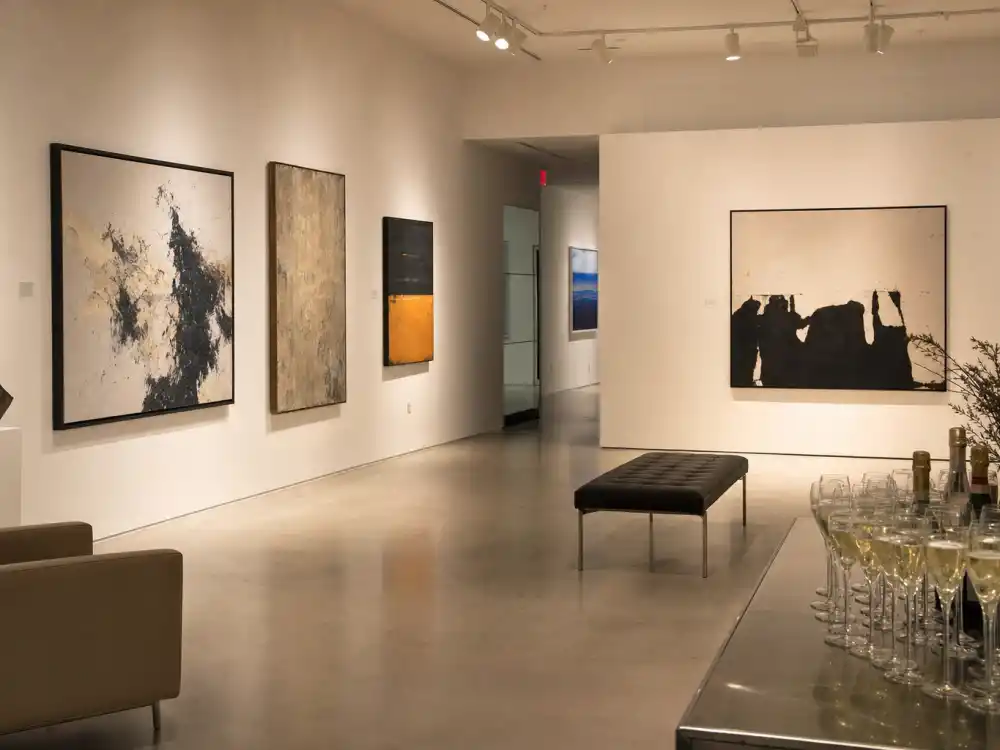 Elegant art gallery private viewing room with champagne, reflecting Leonardo DiCaprio celebrity lifestyle