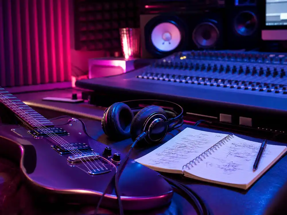 machine gun kelly megan fox 700 percent search spike may 2026 speculation includes new music buzz in a neon-lit recording studio.