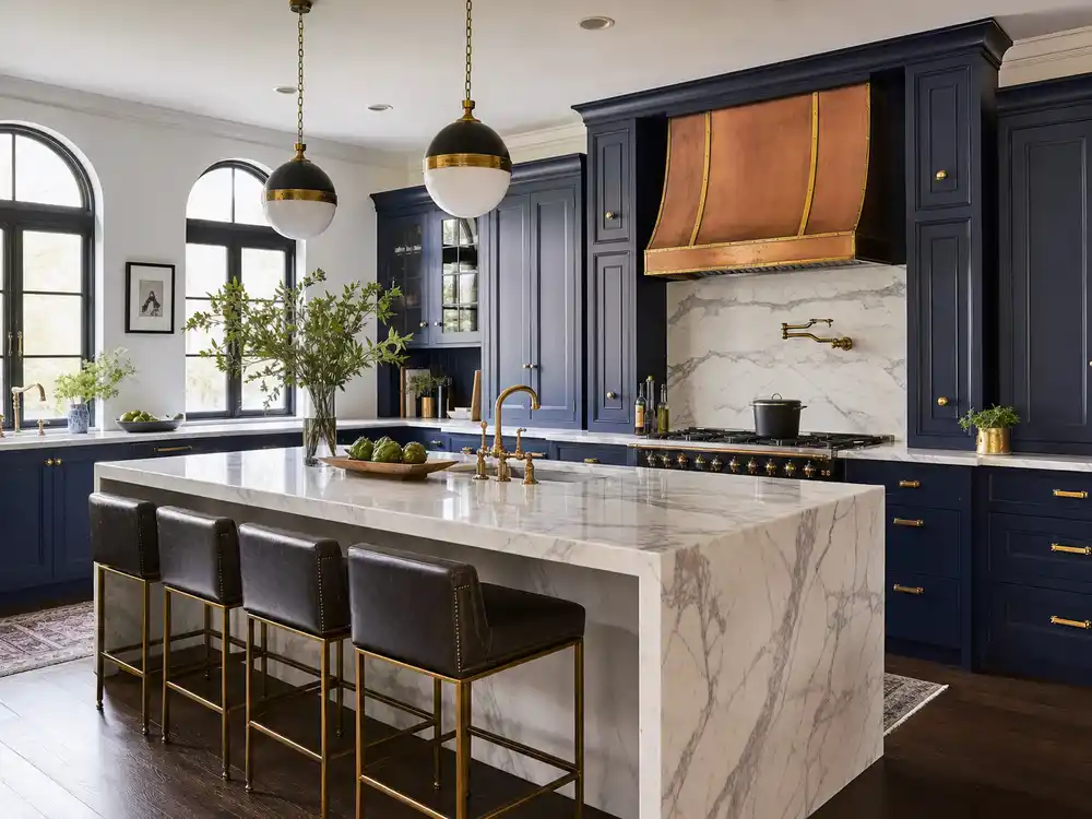 Mark Wahlberg house Florida chef kitchen with white marble waterfall island and copper pots