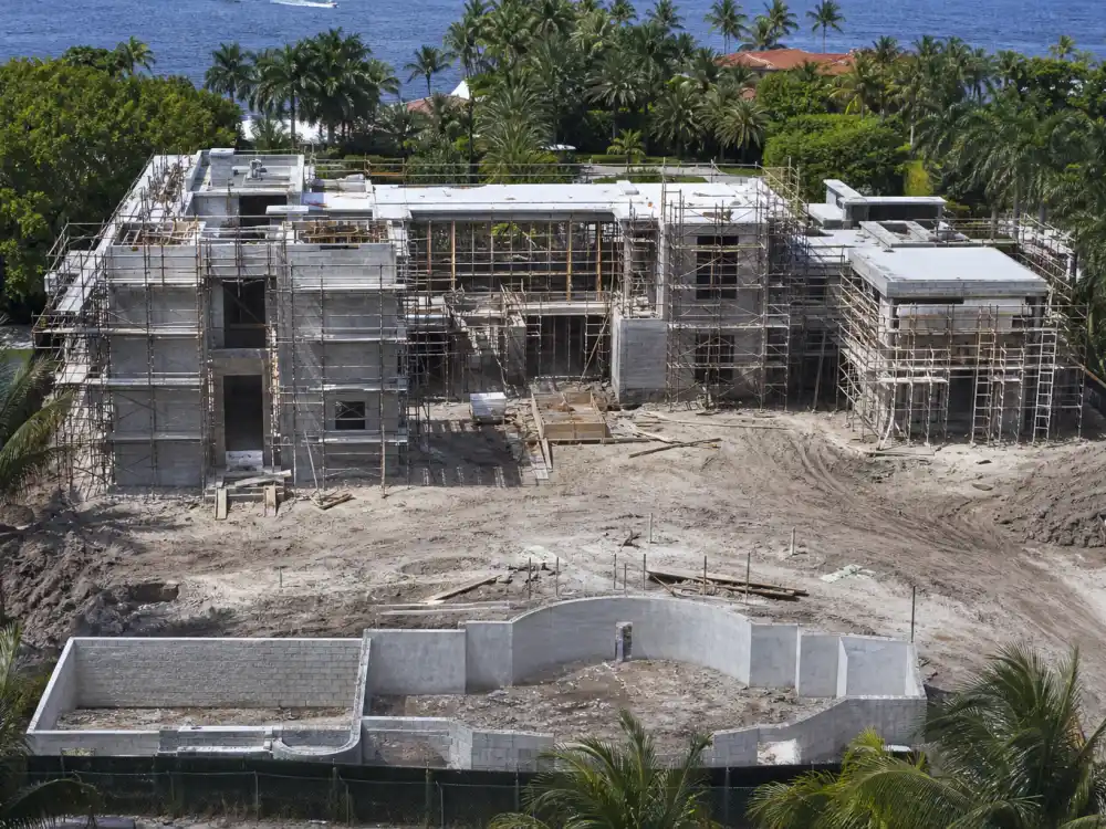 Unfinished mega-mansion construction site like the Mark Zuckerberg Indian Creek $170 million teardown plan