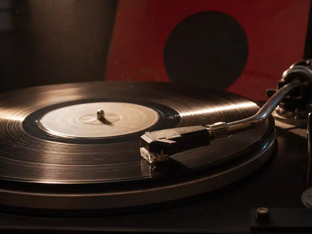 Vintage vinyl record on a turntable representing Rhythm Nation 1814 inducted at the Janet Jackson Grammy Hall of Fame