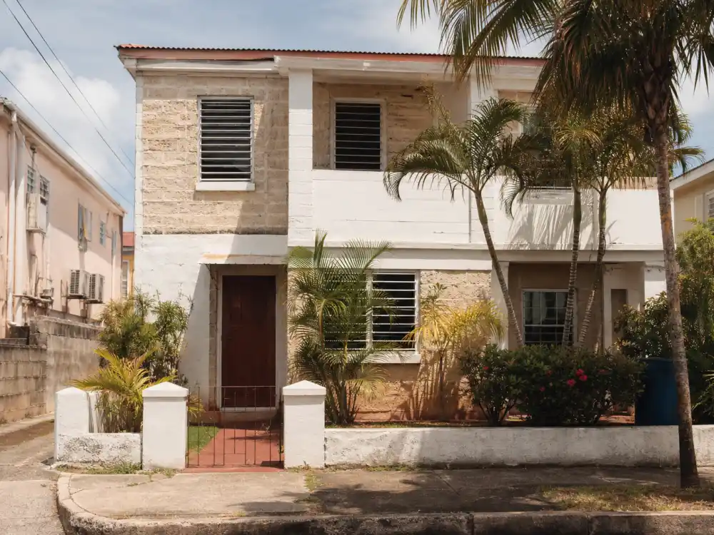 Modest coral-stone Bajan house in Bridgetown Barbados where Rihanna lived as a child before fame