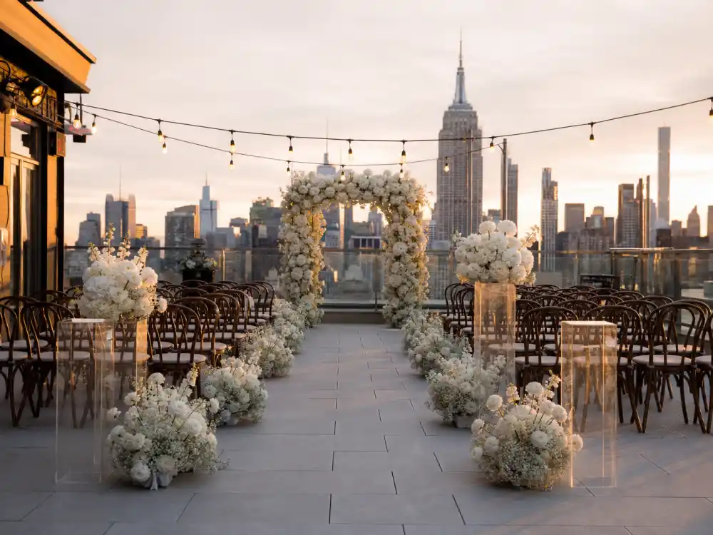 Intimate rooftop wedding ceremony setup in New York City where Scarlett Johansson and Colin Jost celebrated their love