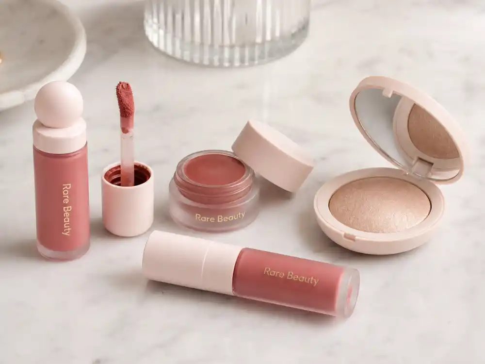Rare Beauty makeup products on display reflecting Selena Gomez independence after ex-boyfriends era