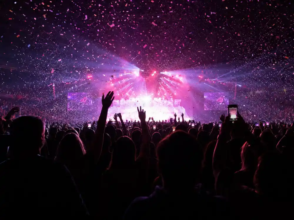 Concert arena atmosphere during a major pop tour where Taylor Swift Travis Kelce romance blossomed