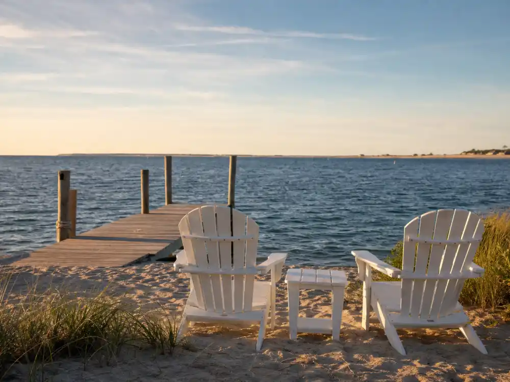 Private beachfront with Adirondack chairs at Watch Hill where Taylor Swift lives in Rhode Island