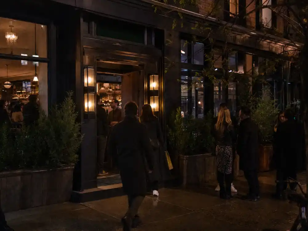 Brooklyn cocktail bar exterior inspired by the Taylor Swift Travis Kelce NYC dinner reports.