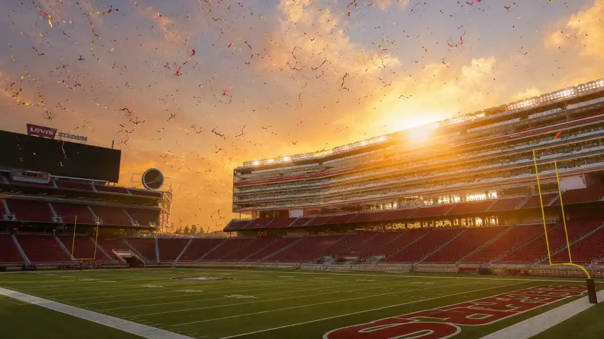 Football stadium at sunset capturing the romantic atmosphere of the Taylor Swift Travis Kelce love story
