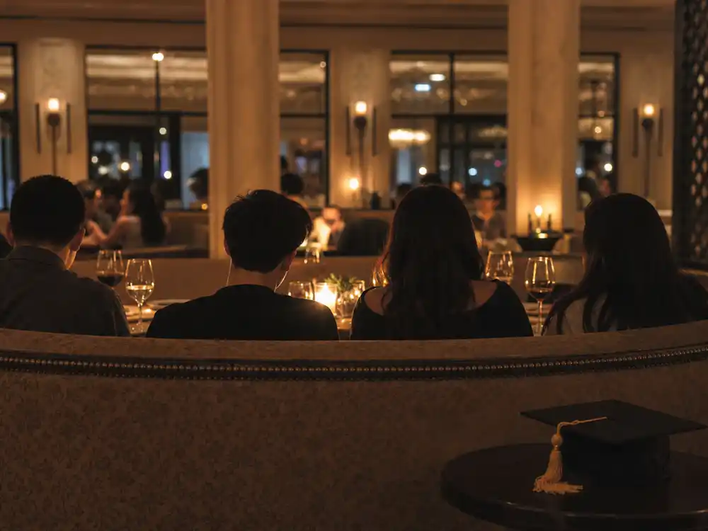 Vanessa Trump family dinner atmosphere is represented by anonymous silhouettes at a restaurant.