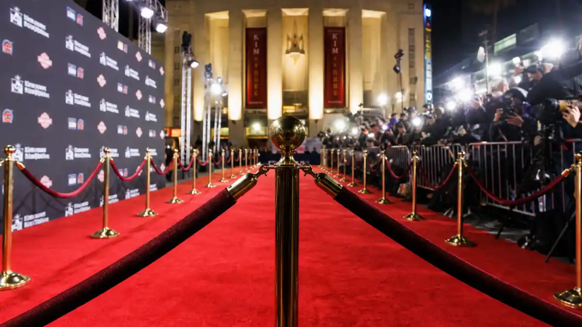 Red carpet at a movie premiere where fans wonder who is Timothee Chalamet dating