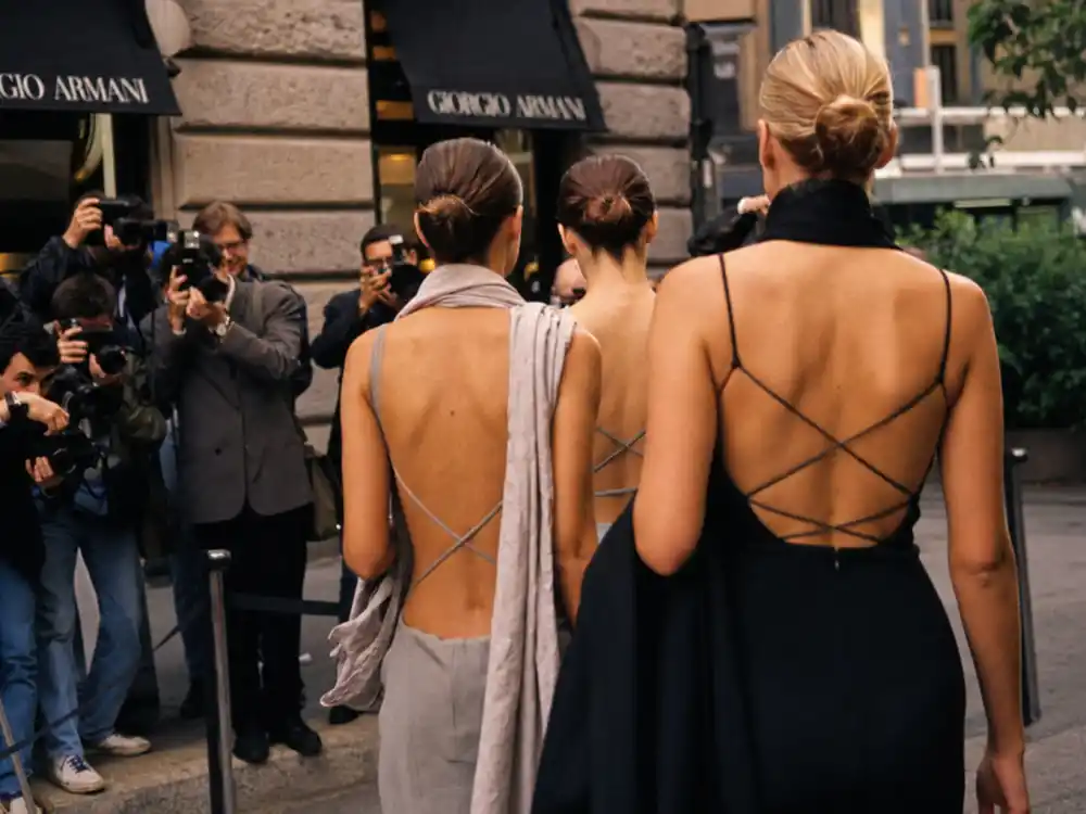1990s Milan fashion week street scene outside venue for 90s supermodels where are they now Italian luxury era