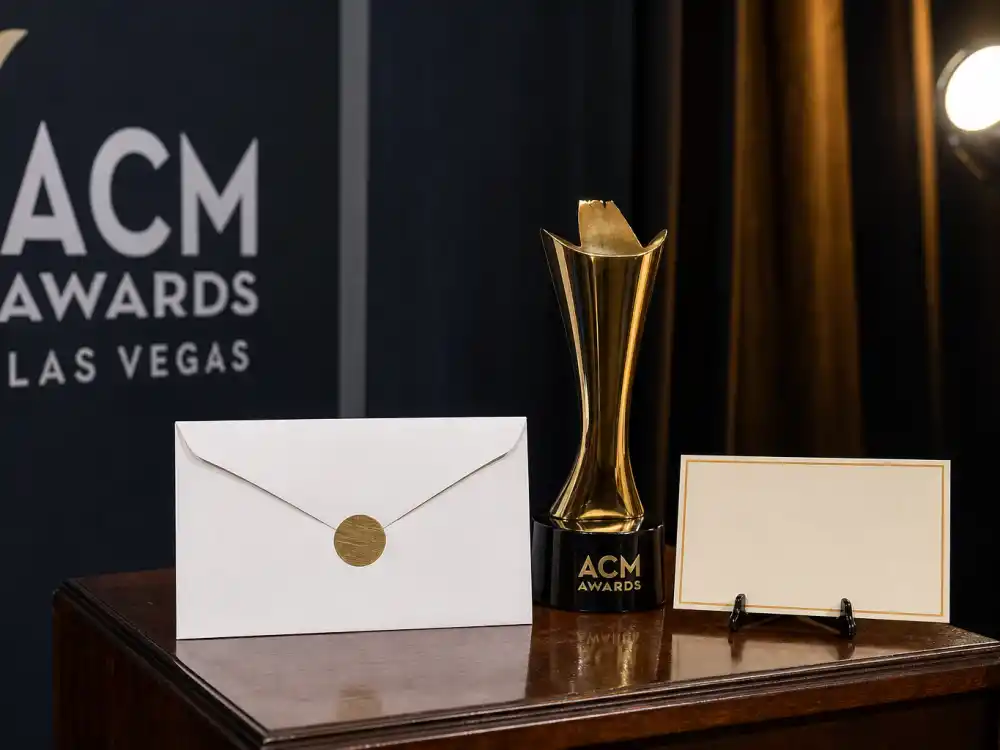 Sealed envelope on podium beside ACM trophy after May 17 ceremony when ACM Awards 2026 winners list went live on Prime Video