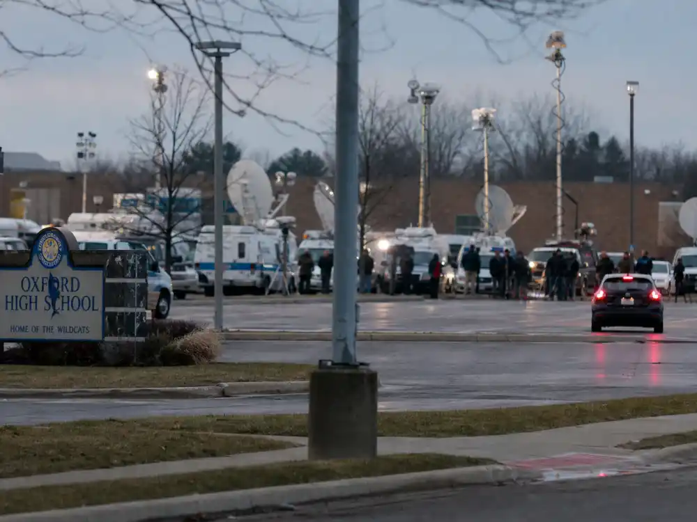 News vans outside high school for what happened to Alex from Target harassment and media frenzy
