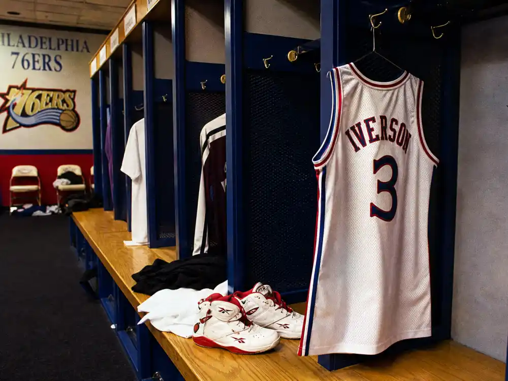 Empty 1990s NBA locker room for where is Allen Iverson now Philadelphia 76ers icon era