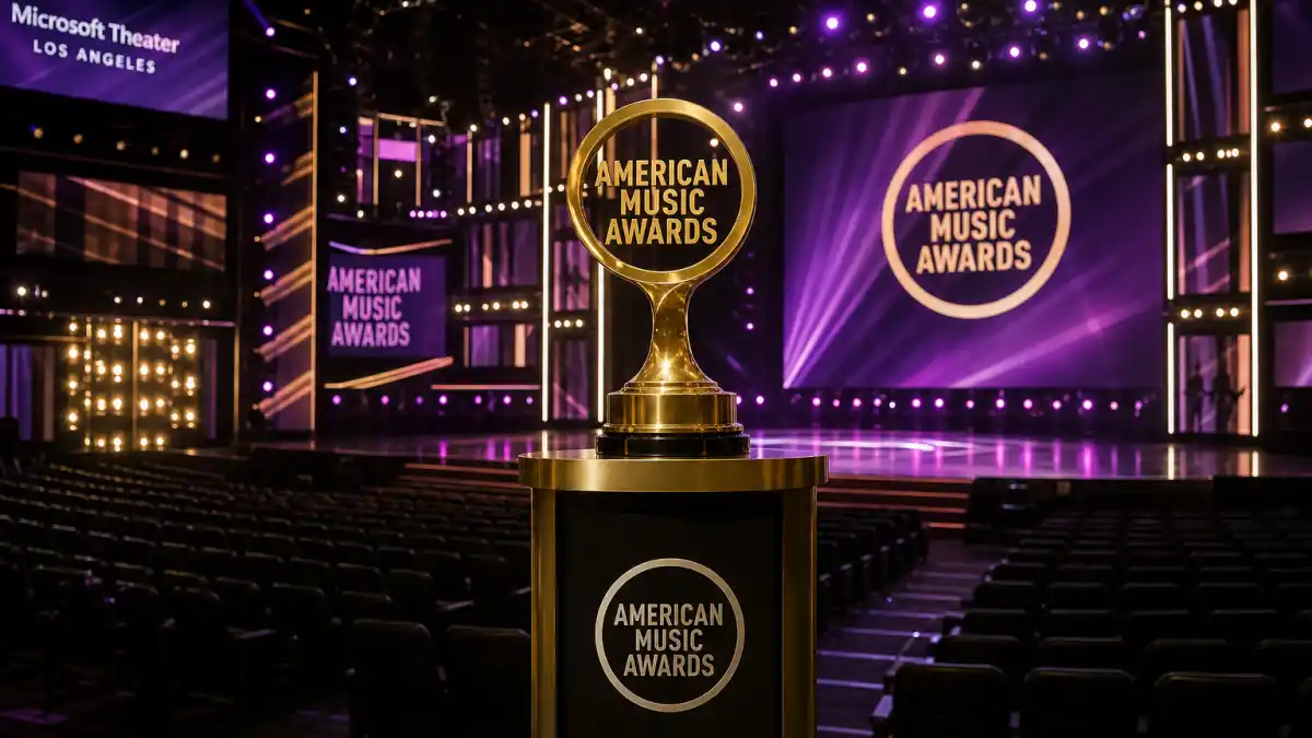 AMA Artist of the Year winners list — golden American Music Awards trophy on Microsoft Theater Los Angeles stage with purple ceremony lighting