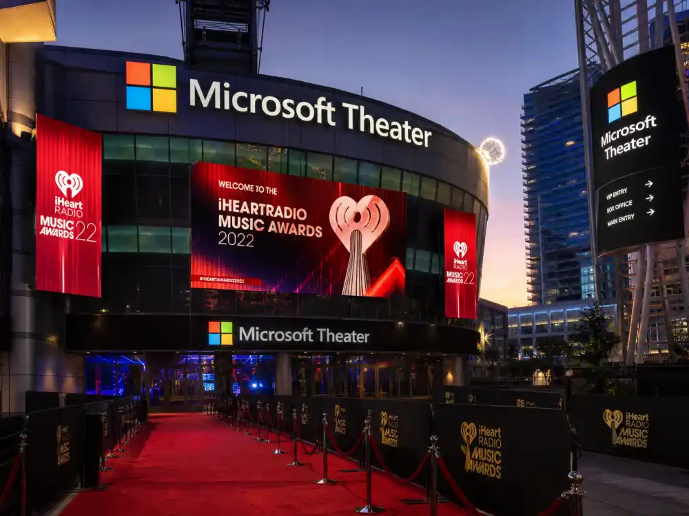 Microsoft Theater Los Angeles exterior at dusk where AMA Artist of the Year winners list honorees accept fan-voted trophies each ceremony