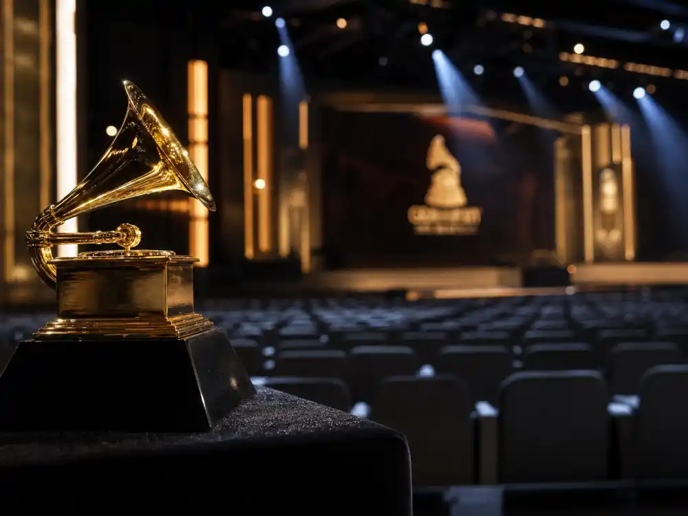 Gold gramophone Grammy trophy for American Music Awards vs Grammys difference — industry prestige and peer-respected Recording Academy honors