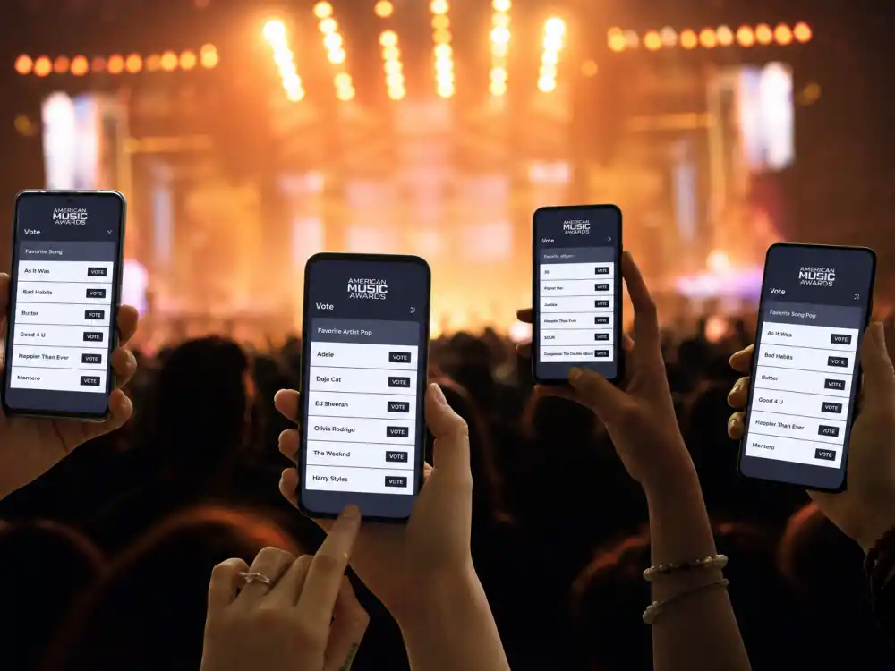 Fan voting on phones for American Music Awards vs Grammys difference — public AMA ballots contrast with Recording Academy peer voting