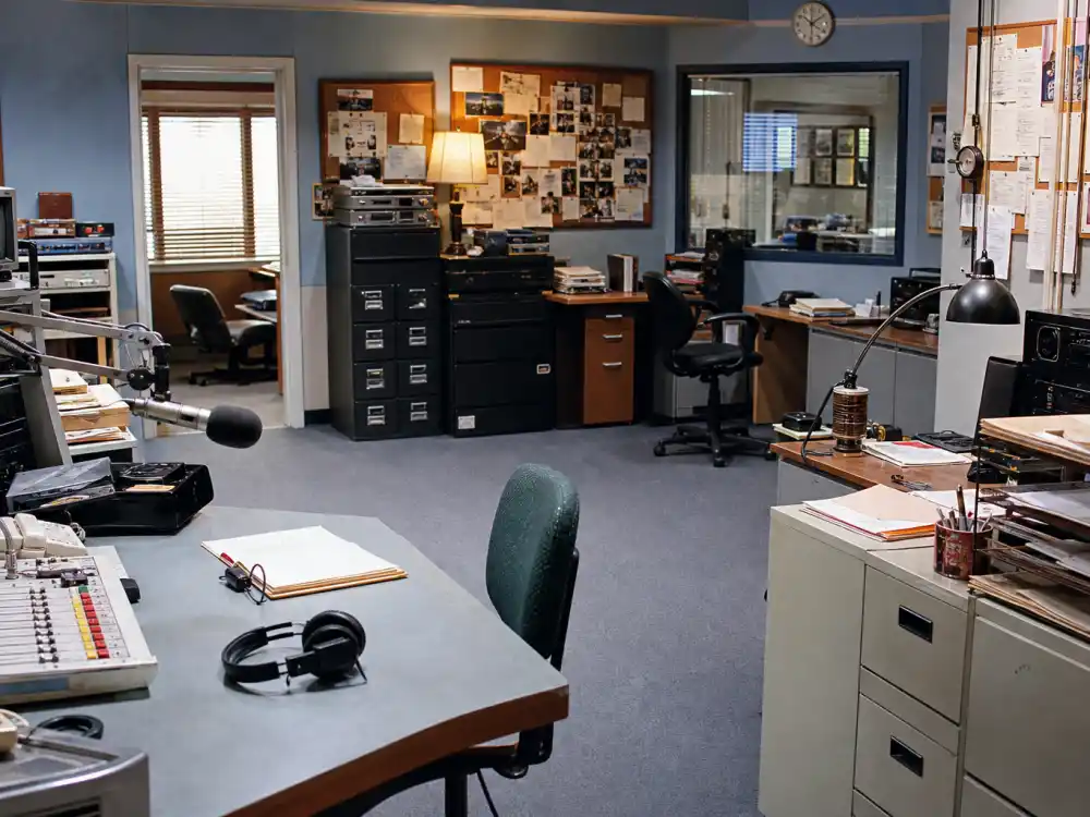 Radio newsroom office set for what happened to Andy Dick NewsRadio sitcom peak as Matthew Brock