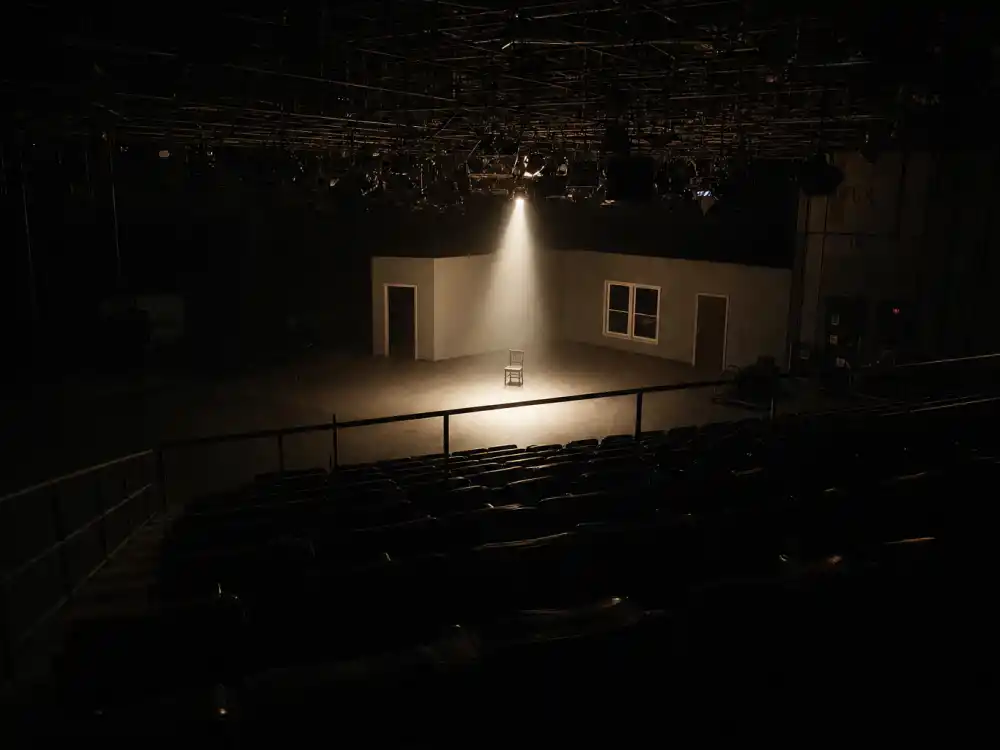 An empty television soundstage spotlight for Angus T Jones decision to leave show business in 2012
