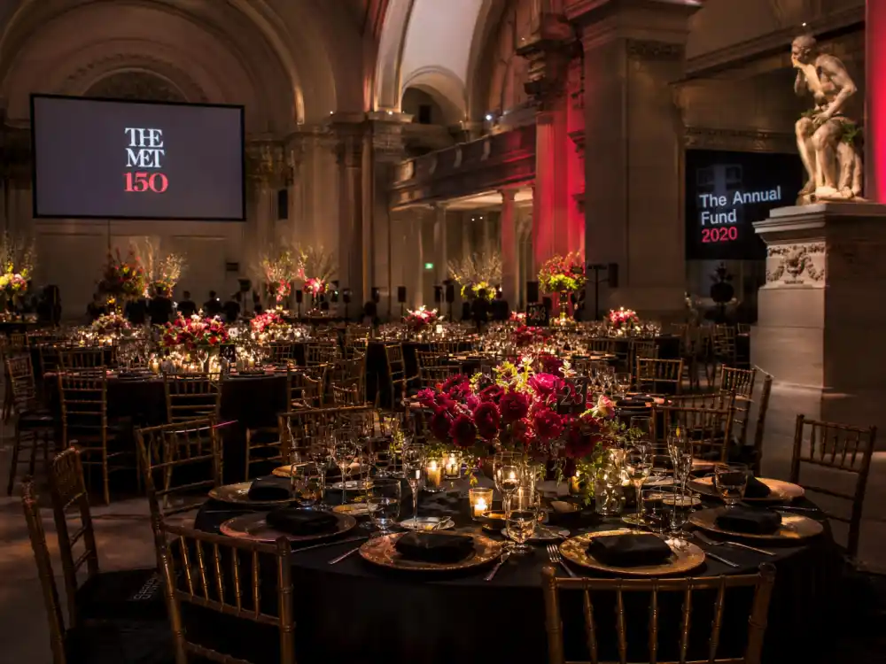 Black-tie Met Gala dinner tables — Anna Wintour Met Gala role explained includes raising millions for the Costume Institute each May