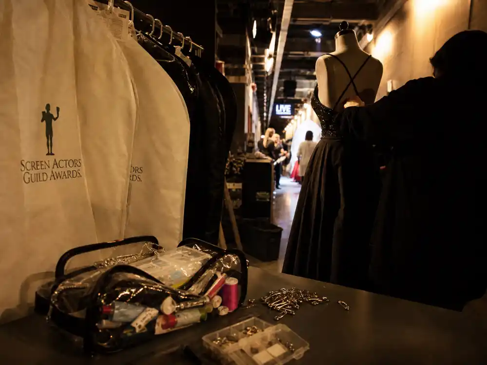 SAG Awards backstage corridor with emergency sewing kit illustrates award show wardrobe malfunctions live TV risks at Screen Actors Guild ceremonies