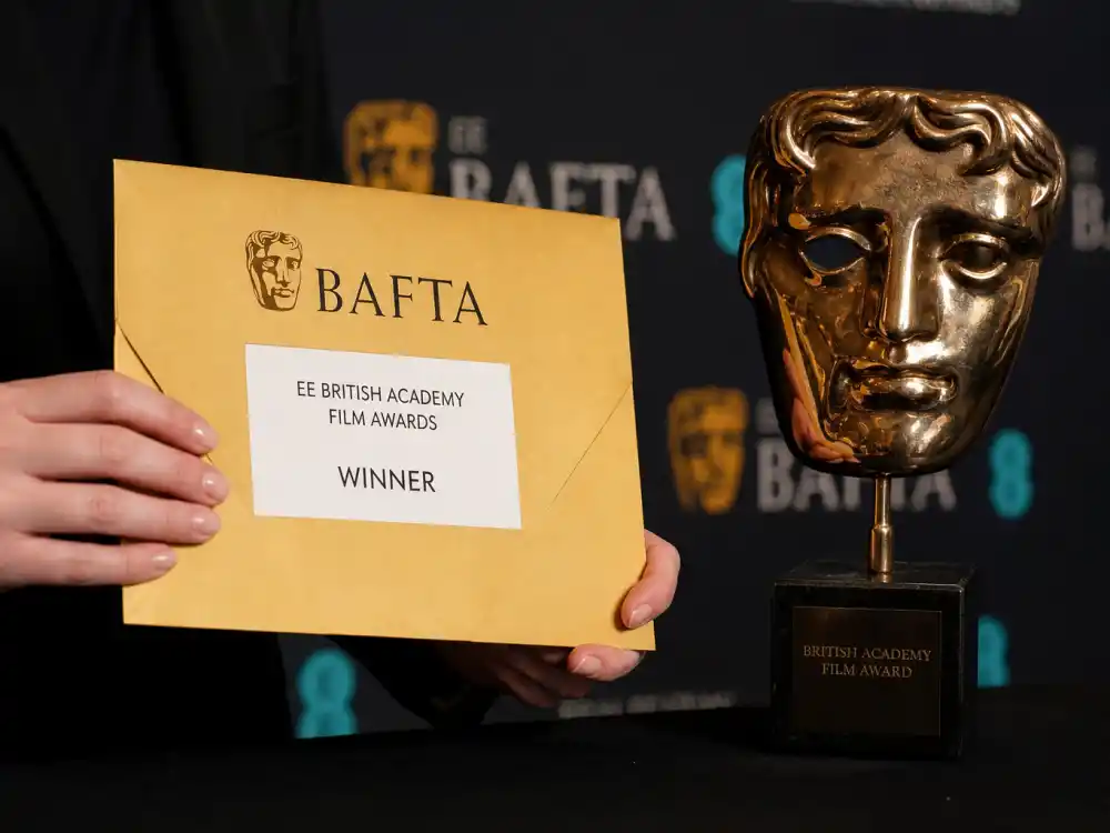 Winners envelope and BAFTA trophy at the BAFTA Awards 2026 winners list press room where Sean Penn and Wunmi Mosaku claimed supporting acting prizes