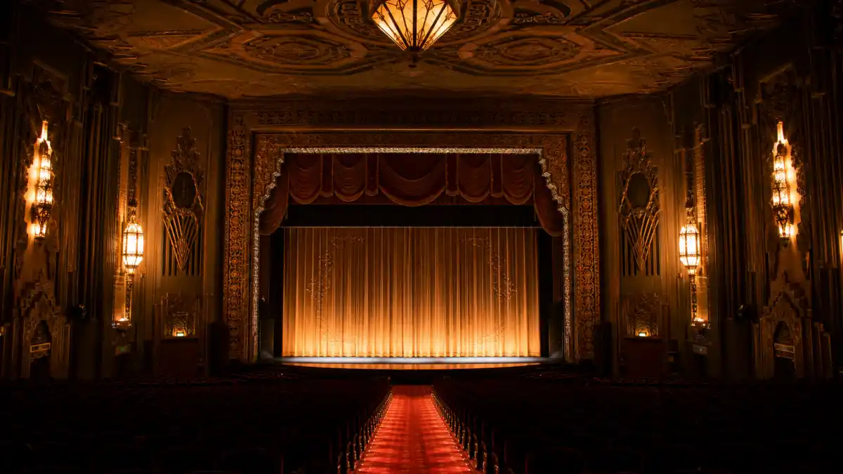 Best actress Oscar winners list by year — historic movie palace theatre interior evoking decades of Academy Awards lead actress history