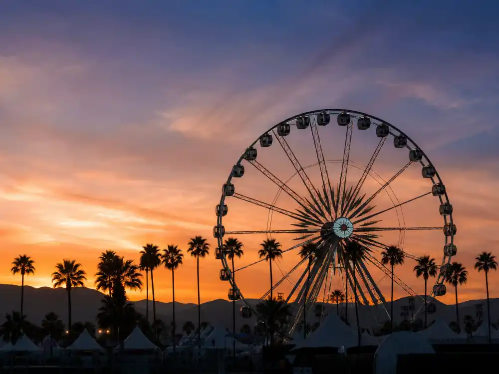 Coachella ferris wheel silhouette at desert festival sunset in Beyonce Coachella kids cameo explained — Indio grounds where Blue Ivy watched Beychella 2018