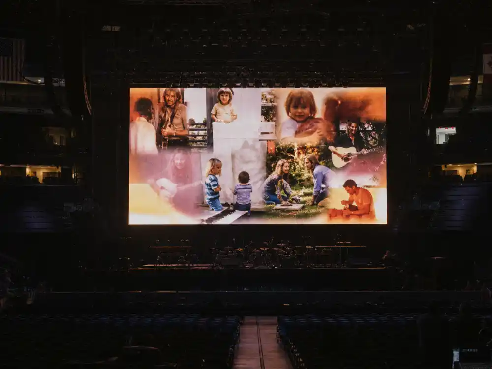 Arena jumbotron home video montage glow in Beyonce twins Rumi and Sir rare appearances — Sir Carter screen cameo context per Us Weekly