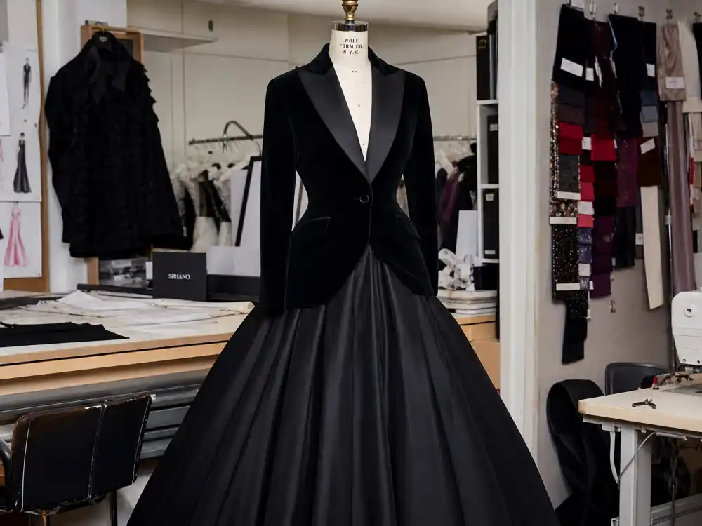 Christian Siriano atelier black velvet tuxedo gown on couture mannequin defining Billy Porter tuxedo gown Oscars history construction and hybrid tailoring